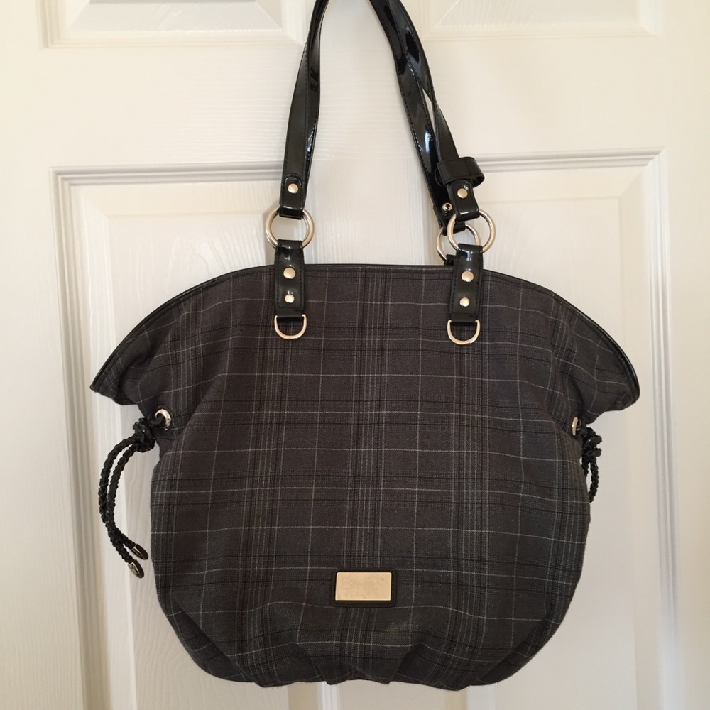 Convertible beijo bag with snap out interior.